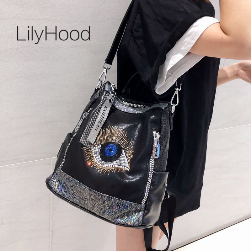 Leather Work Womens Backpack - กระเป๋าเป้สะพายหลังผู้หญิง หนังวีแกน ดีไซน์ทันสมัย ประดับคริสตัลรูปตาปีศาจ ขนาดใหญ่ จุของได้เยอะ